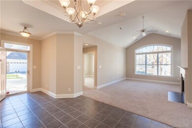 Enter into tiled foyer. Dining Room has tray and t