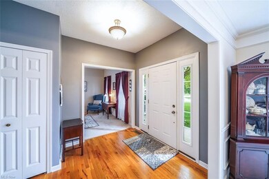 Entry way of the home.  Home features hardwood woo