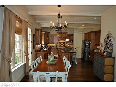 Breakfast. The breakfast room joins the kitchen, den, and butler s pantry.
