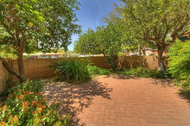 Private bricked courtyard.