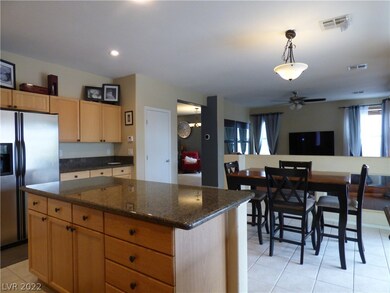 The bright and airy kitchen has dining space, and