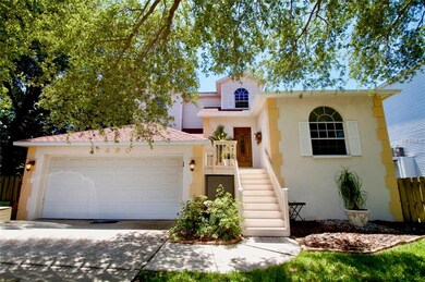 Split level elevated home with beautiful shade tre