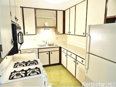 Sweet kitchen with extra tall upper cabinets for b