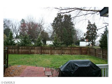 Exterior Back - Backs up to Historic Laurel Meadows.  Privacy Fence and multi-level deck, exterior lighting.