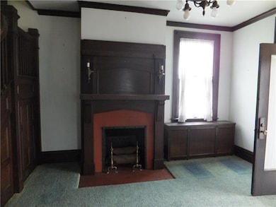 Decorative fireplace in foyer