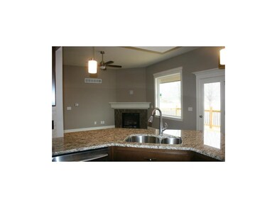 View of dining/hearth room from kitchen