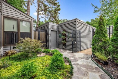 Gate with an outbuilding