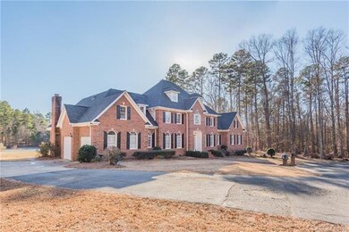 Exterior w/ a 2 car-garage