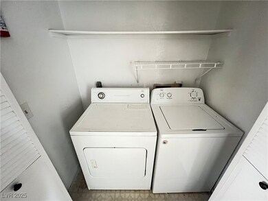 Washroom featuring washer and dryer