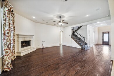 Step into the grand foyer that flows seamlessly in