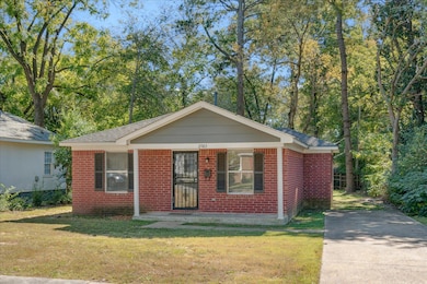 View of front of house with a front yard