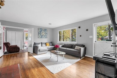 Living room featuring wood-type flooring