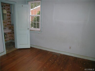 First Floor Bedroom with half bath