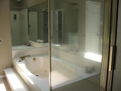 Oversized Whirlpool Tub and Shower in Master Bath.