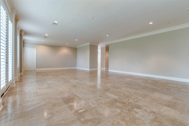 Dining area features Plantation shutters, Ornamental molding, recessed lighting, and baseboards