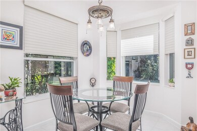 LARGE DINING AREA WITH CUT OUT ART NICHES AND DOUB