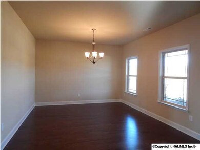 Large Dining Room could also be a flex room. See photos following showing a previous model home dining room.