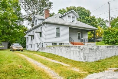 Level corner lot allows for off street parking, re