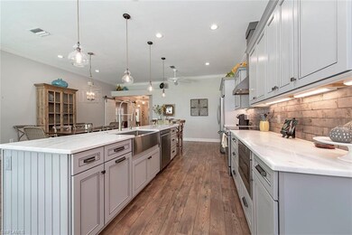 Calcutta L5 granite counters, porcelain tile backs