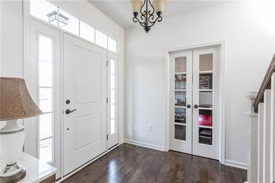 Glass paned French Doors into first floor office o