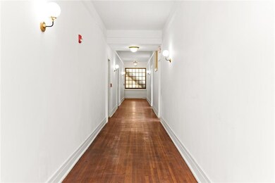 Light and bright hallway leading to lower level co