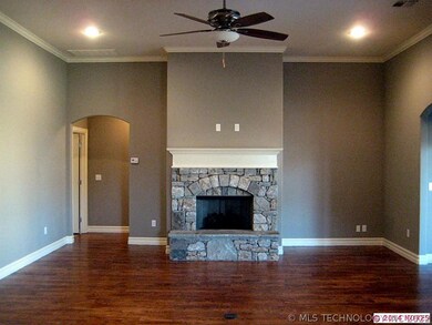 Hardwoods, custom mantle, wired for surround sound