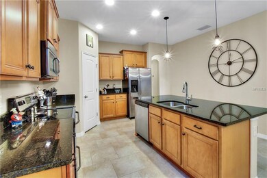 Popular open floor plan with large kitchen island.