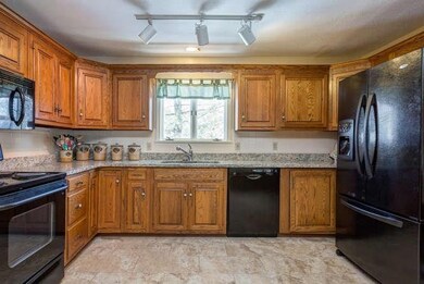 This spacious kitchen has lots of...