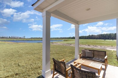 View of patio / terrace with a water view
