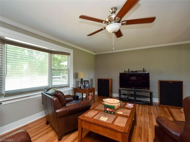 Ample bay window provides view of the gorgeous back of the lot