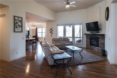 Open concept living room/kitchen dining area with 