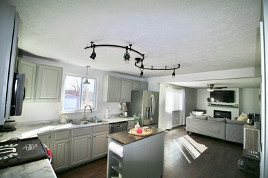 The kitchen connects directly to the family room, providing a large space to entertain and still be able to talk with any guests while cooking in the kitchen.