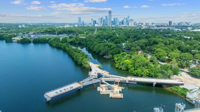 Bird's eye view of a notable bridge, a nearby bod