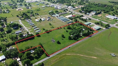 Aerial overview of property's location featuring property approximate boundaries highlighted