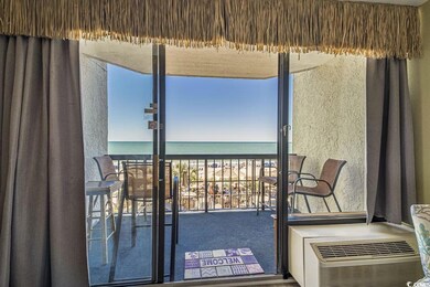 Unfurnished sunroom featuring a water view