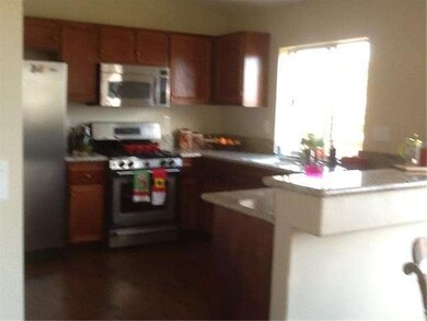 Refinished cabinets, new granite, large walk-in pa