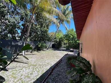 View of fenced backyard