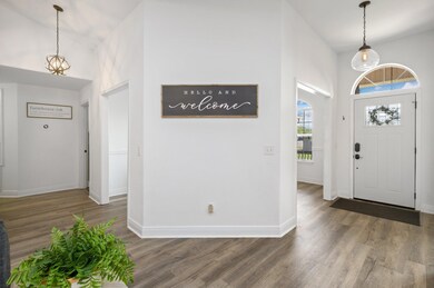 View into foyer/dining room