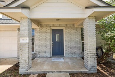 Entrance to property featuring a porch