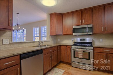 Kitchen w/ granite countertops