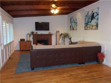 Beautiful hardwood, new wainscoating and charming 