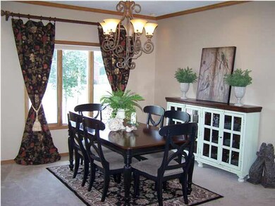 Formal Dining area with lots of natural lighting a