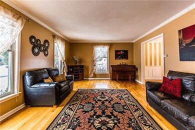Livingroom w/natural light and beautiful hardwoods