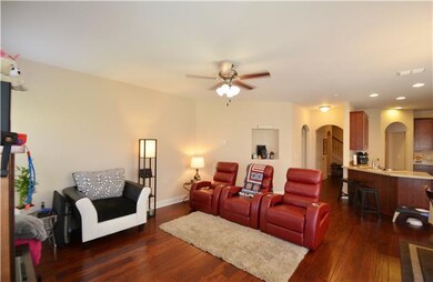 Great Room With Hardwood Flooring