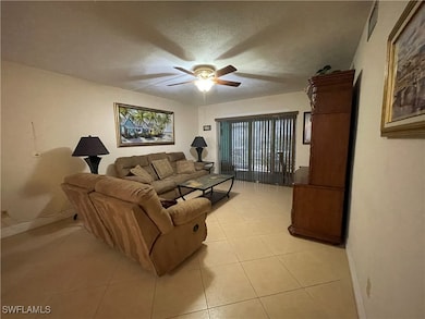 Entryway featuring tile patterned floors and baseboards
