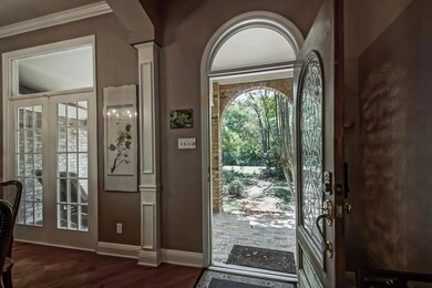 ENCHANTING ENTRYWAY FROM PEACEFUL BRICK FRONT PORC