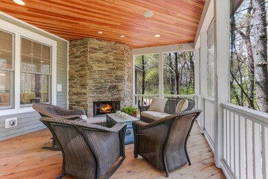 Screened porch sitting area