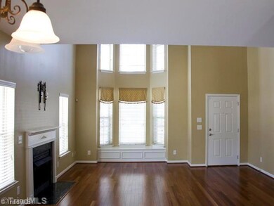Den/Family/Great Room. Another advantage of an end unit is that you can have a gas fireplace.  Hardwoods floors from front to rear.  Double stacked bay window in front with built in window seat!