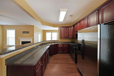 Kitchen featuring stainless steel appliances, sink