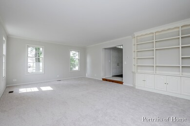 Entertainment sized living room with built in book